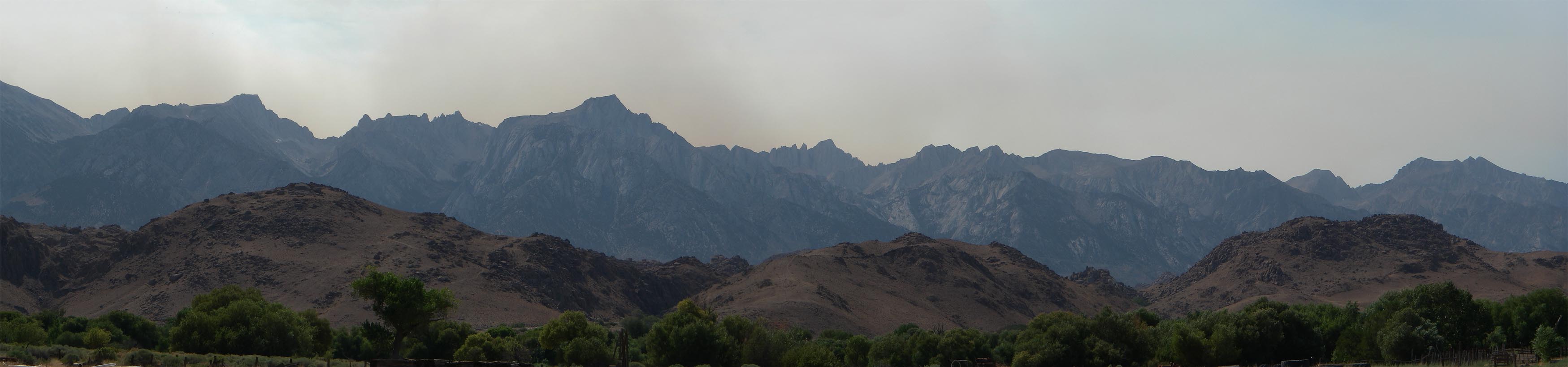 Smoke pouring over the Sierra Crest near Mt. Whitney.  Use scroll button at bottom to pan right. 8/29/2020 