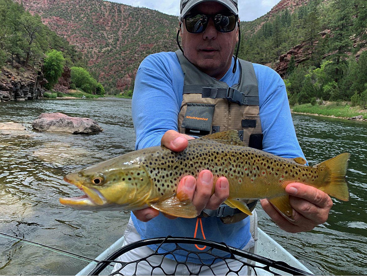Brad R. flyfishing for brown trout on a river somewhere in North America 8/2020