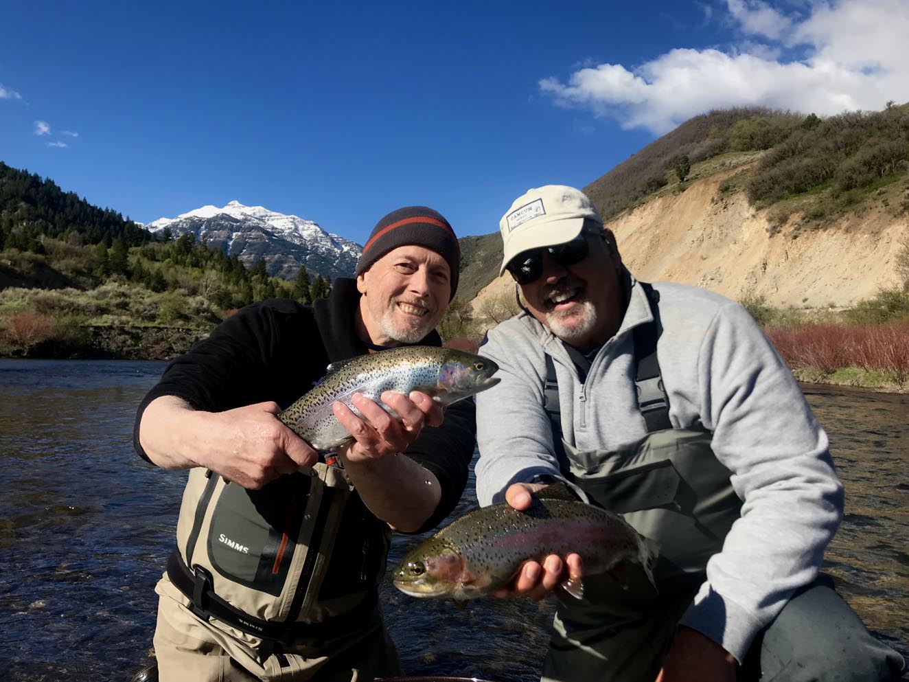 Doug and Brad with 2 of several quality rainbows and browns fishing a river somewhere in North America 5/2021