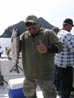 Two thumbs up from Breakwall Robert for another salmon caught on his Alaska trip 2011