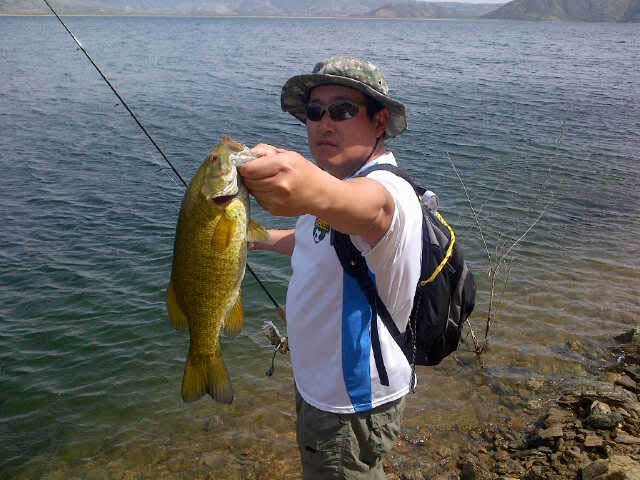 Wook with his own nice smallmouth bass he caught at Diamond Valley Lake 4/8/2012