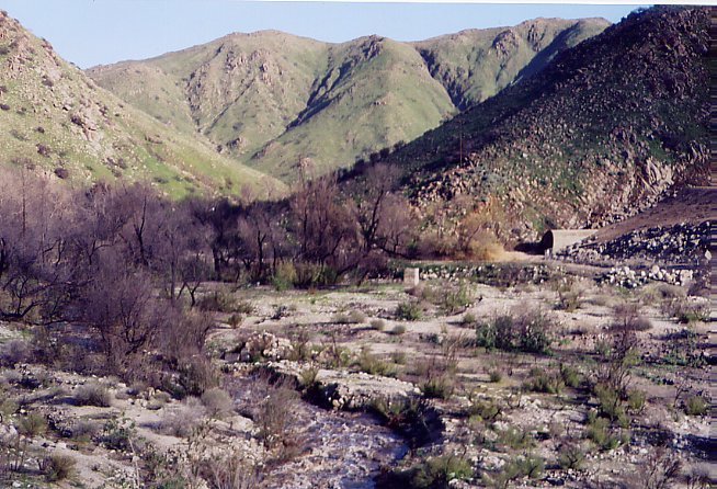 Corona Lake dam gushing water from the outlet after severe winter storms 2/2005.