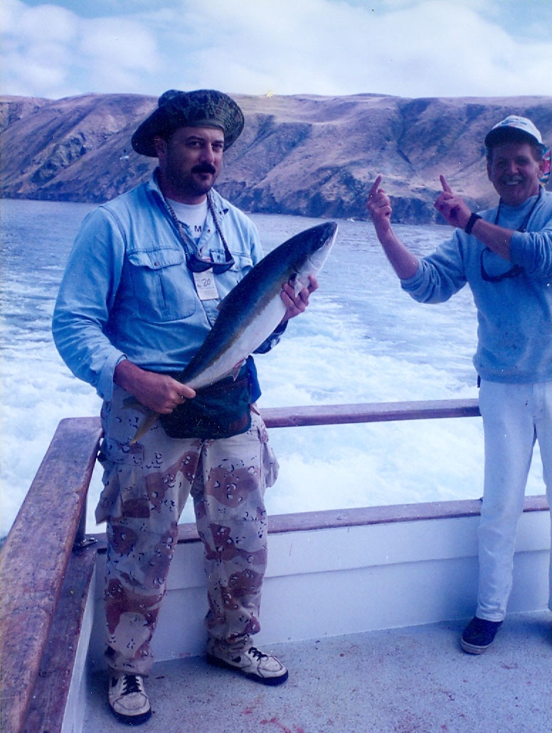 Mike Dufish caught a bonito then used its belly meat to land this nice yellowtail aboard the Searcher at San Clemente Island 1996