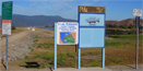 Confusing signs at the entrance of Lake Elsinore Levy.  Hmm, middle sign says fishing area but the two signs on the outside say NO FISHING 4/21/2009