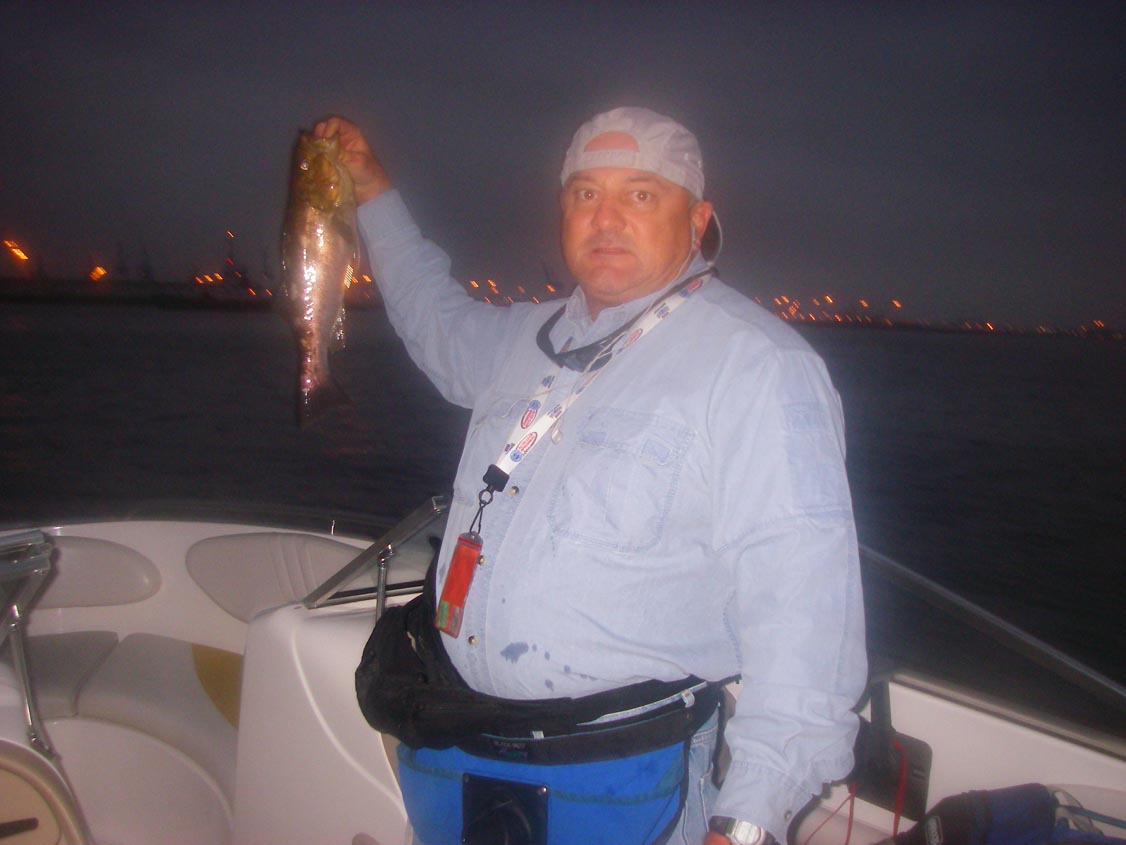 Mike Dufish with a descent calico bass caught at Angels Gate 6/24/2009