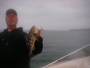 Breakwall Darryl pulls out a 2-lb calico bass out of Angels Gate 6/24/2009