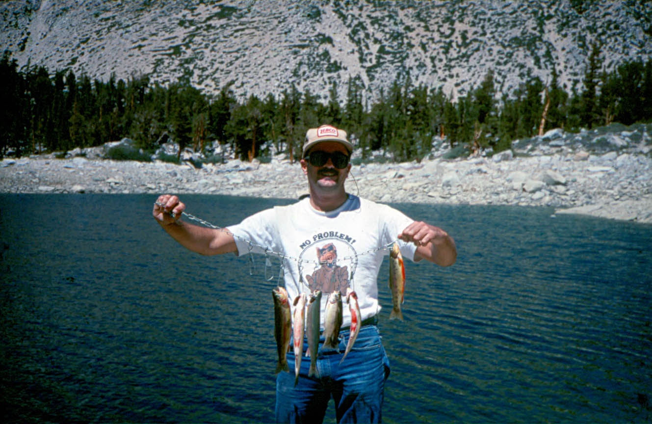 Mike Dufish with a nice stringer of golden trout caught at his secret High Sierra high country lake 1989
