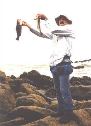 Dufish caught a 2lb sand bass while using mussel on 8lb test from Crescent bay rocks, 5/2002