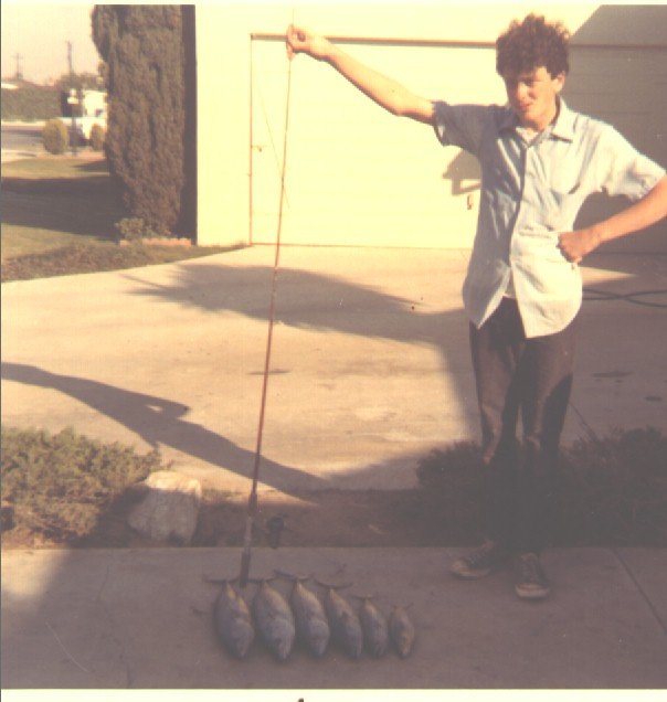 Teenage Dufish with bonito caught from Redondo Beach's King Harbor, 1971