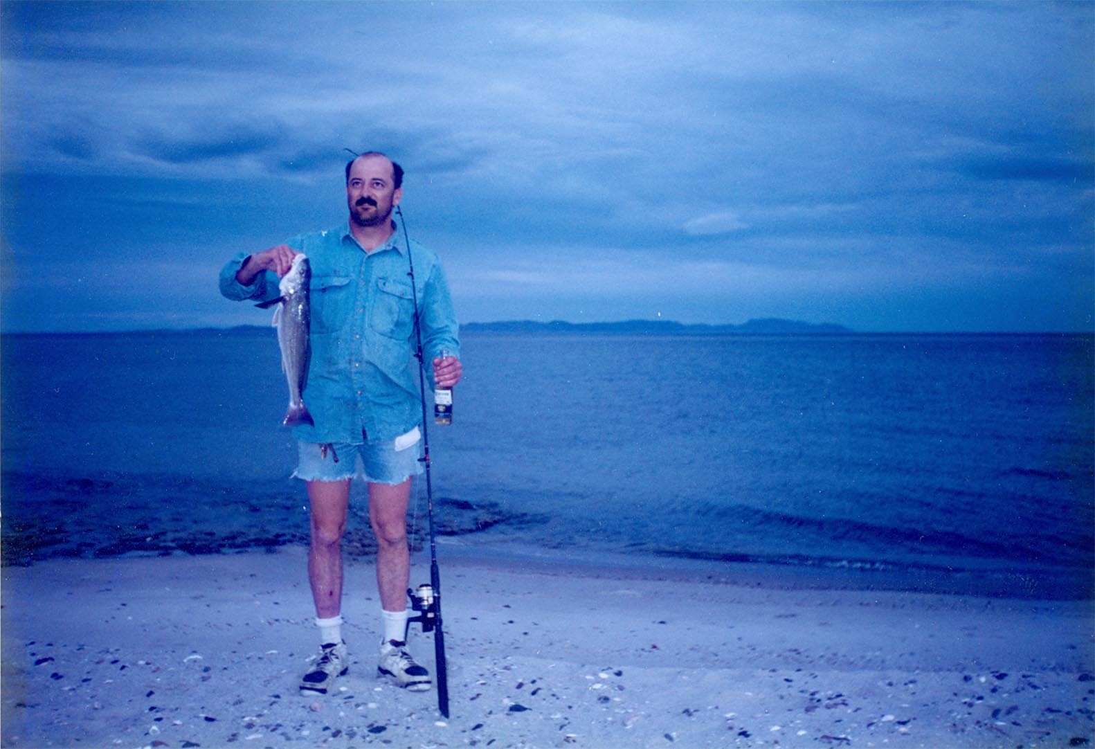 Mike Dufish does a Corona commerical at Playa San Rafael, Baja California, by catching a nice corbina with a curly tail grub 3/1994