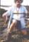 Dufish cut his shin when he slipped on the rocks while reeling in this sargo near Emerald Bay, 7/2000