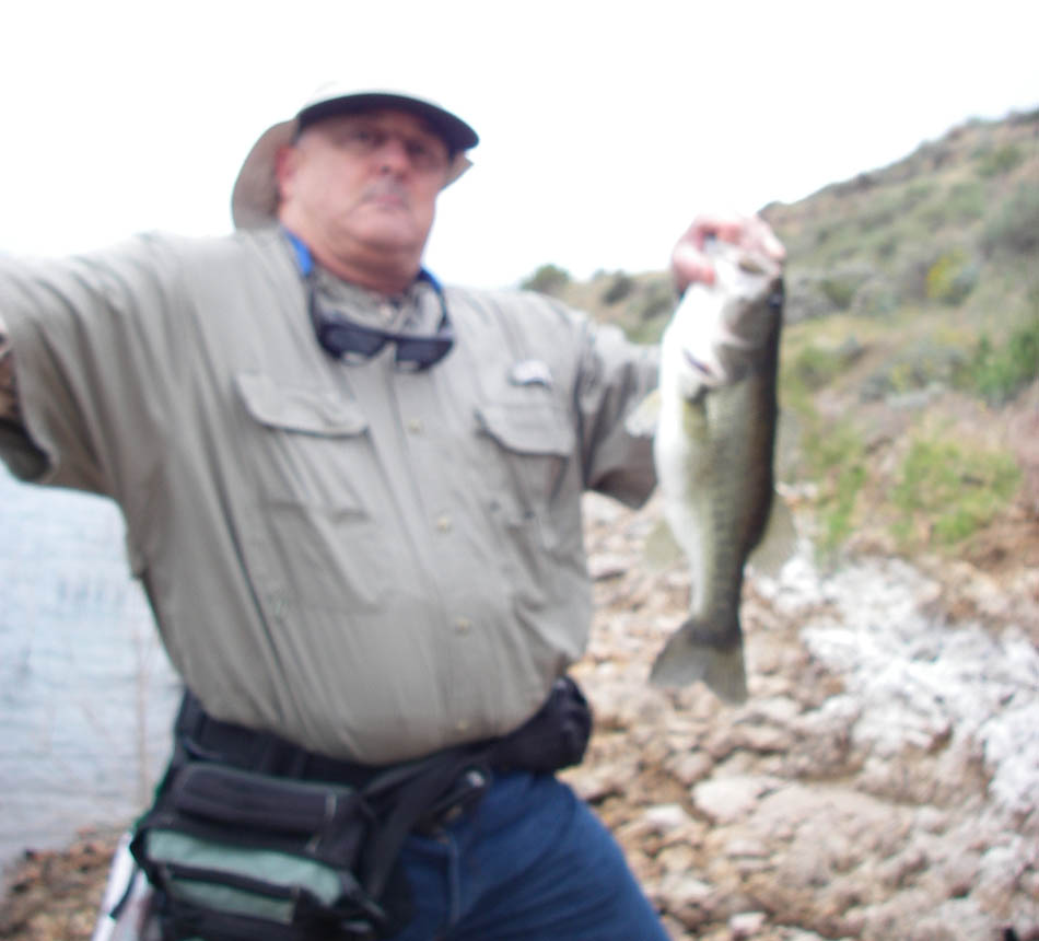 Mike Dufish with a StickPic of himself hoisting a 2-14 bass caught on a purple worm at Diamond Valley Lake 5/2/2012. 