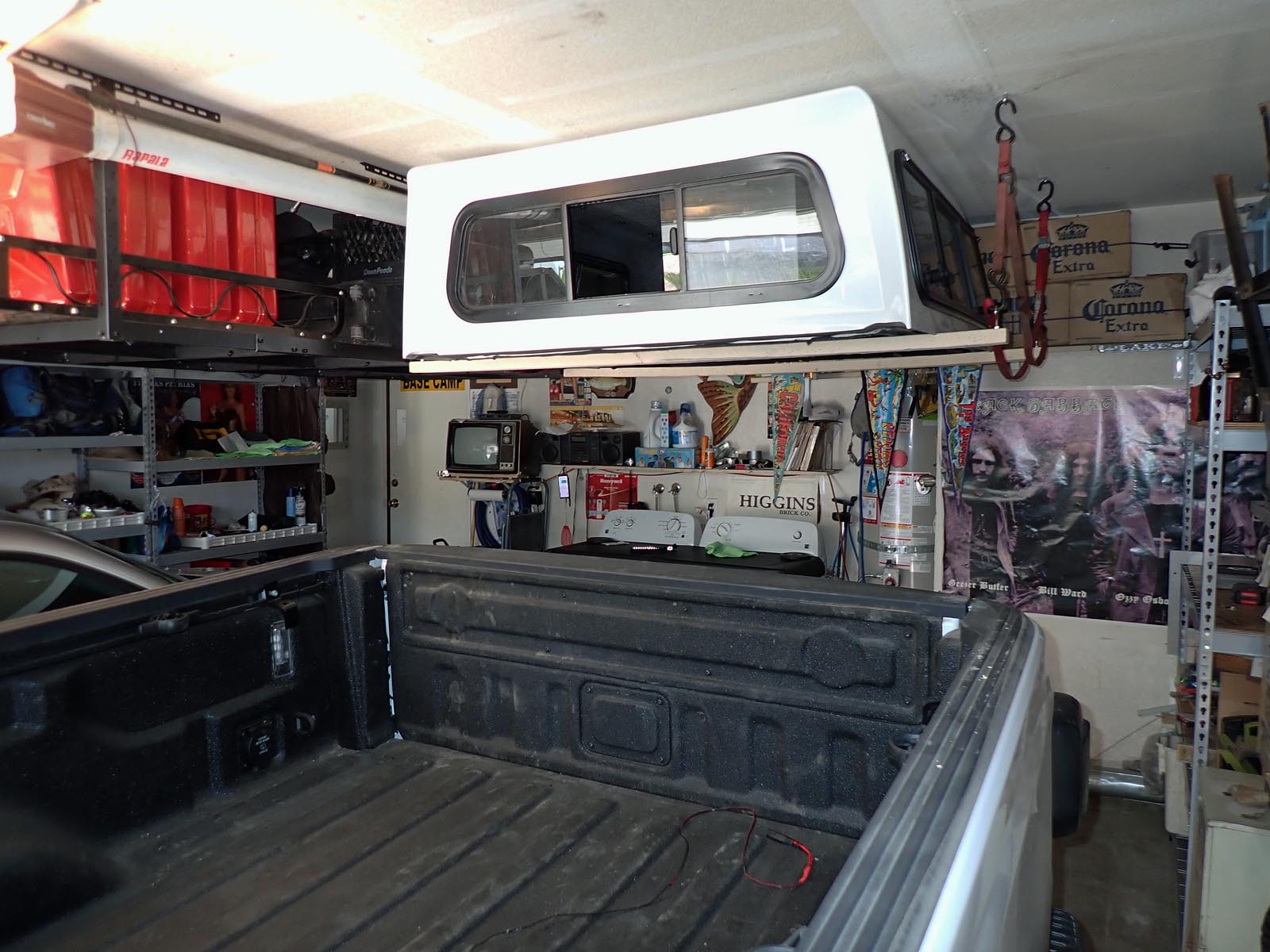 Figured out how to hang the new camper shell from the garage ceiling 3/1/2022