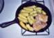Yellow chilis fried in chicken fat for salsa, 7/2003