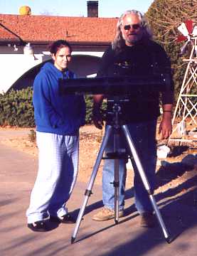 Jeff E. and his kid Jessica got a new telescope for Christmas 2002. We viewed the rings of Saturn that evening