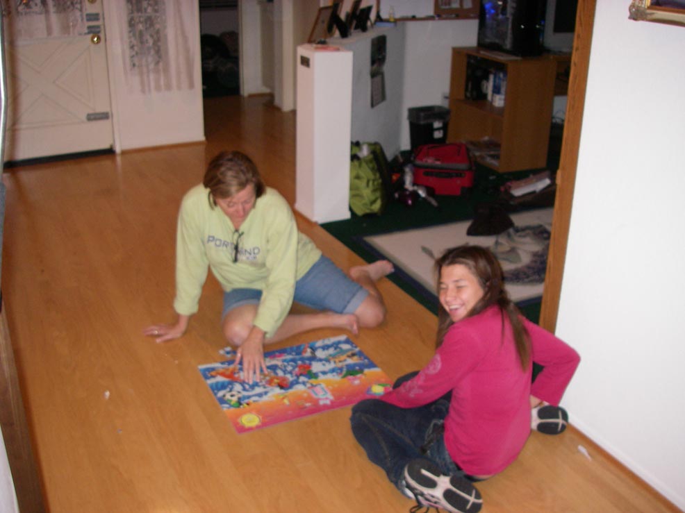 Tracey and Jessica assembling a puzzle T-day 2008