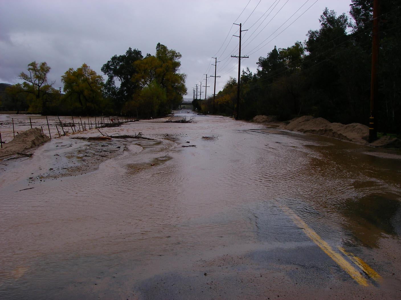 Temescal Creek flowing over Temescal Canyon Road 12/22/2010
