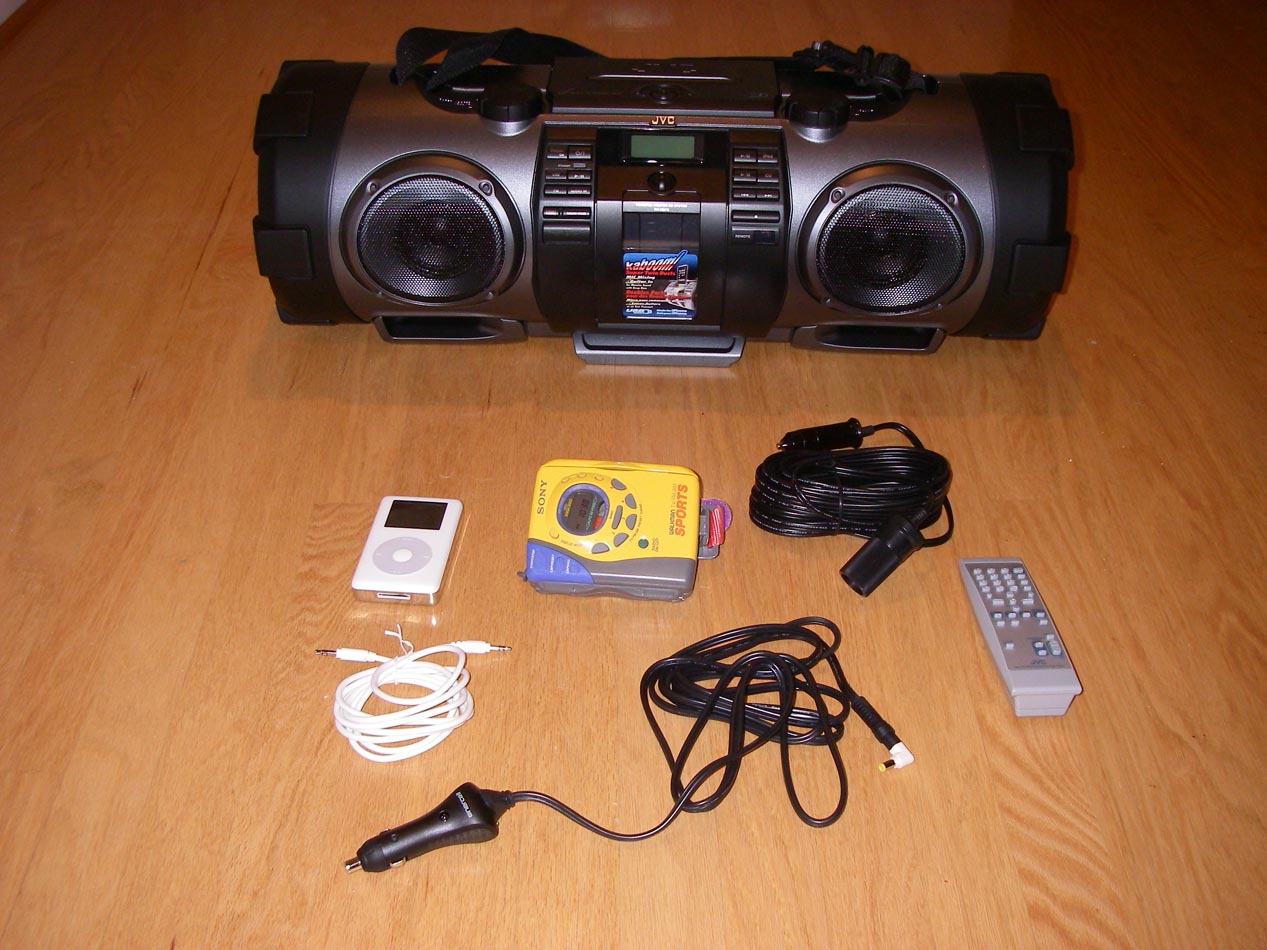 My new really loud JVC Kaboom iPod dock with walkman, 12-v cable and extention cord and remote 11/20/2011