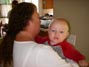 Candy holding Denay's latest T-baby on Thanksgiving 11/22/2012