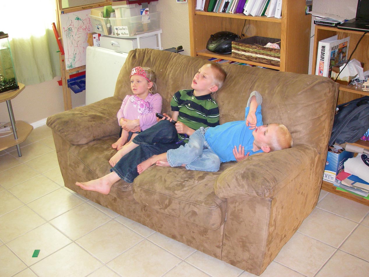 Tathena, Thayne and Taton watching TV on Thanksgiving 11/22/2012