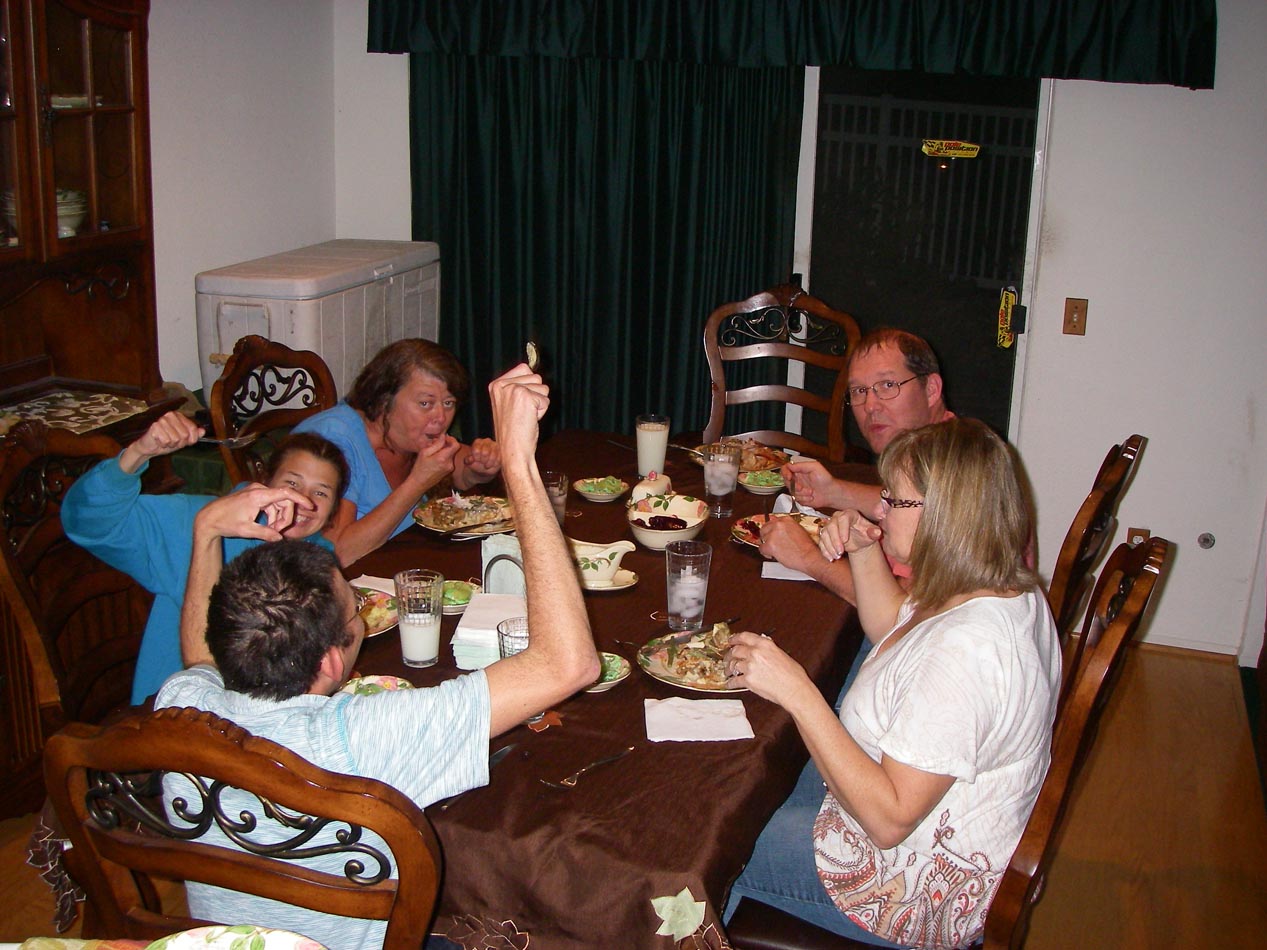 Bo Jessica Candy Steve and Tracie digging in to Mike Dufish's turkey dinner Thanksgiving 2013