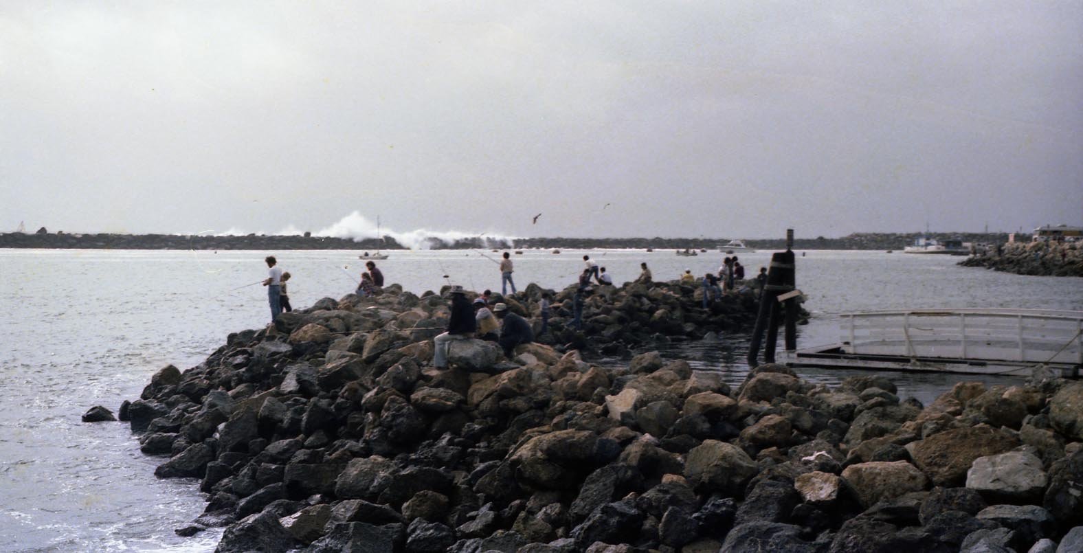 Better to fish inside the King Harbor when the surf is up at the breakwall 1980