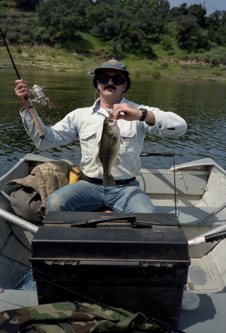 Mike Dufish nails a two pound bass from Lake Cachuma 4/1992